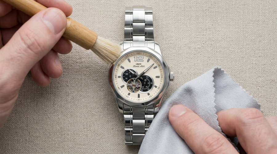 Business Steel Watches – Professional, Polished & Boardroom-Ready Every Day firefly gemini flash top down flat lay photo of a stainless steel watch being gently cleaned with a soft b 598830
